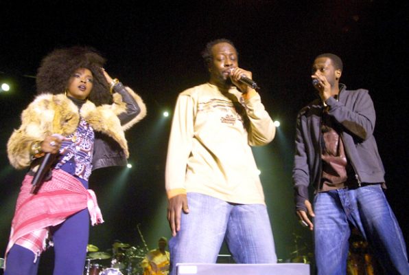 Fugees perform on stage