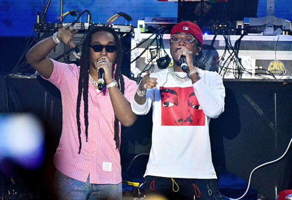Quavo and Takeoff perform together as Migos at a February 2020 concert in Miami.