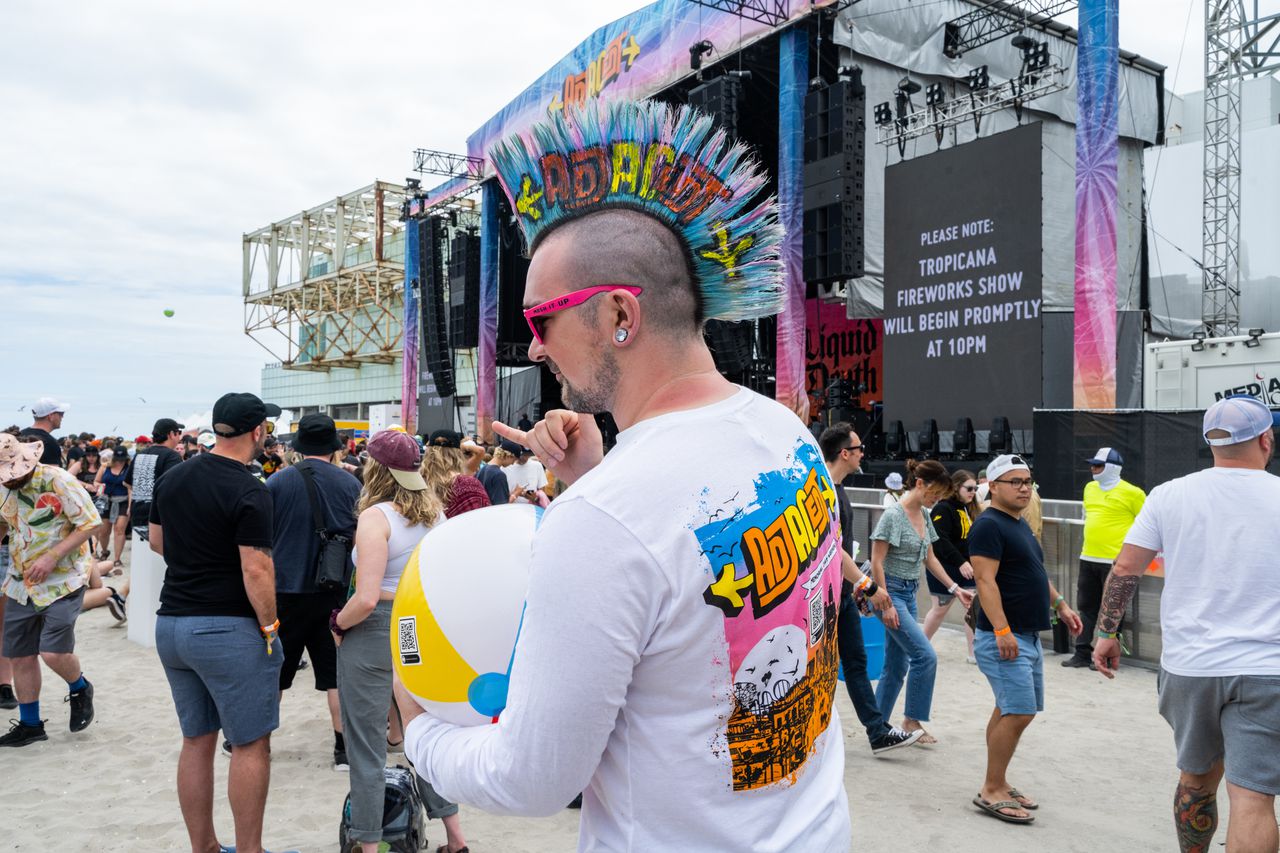 Attendees enjoying the beach and activations on day two of the inaugural Adjacent Music Festival in Atlantic City, New Jersey on Sunday, May 28, 2023.