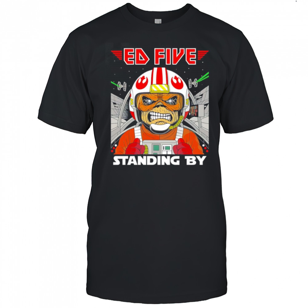 Ed Five standing by shirt