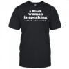 A black woman is speaking listen and learn shirt