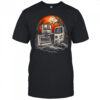 A cemetery of obsolete technology a floppy disk a cassette tape and a Game Boy shirt