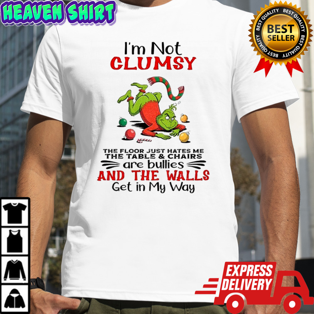 Grinch Santa hat I’m not clumsy the floor just hates me the table and chairs are bullies and the walls Christmas shirt