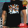 Three cartoon snowmen wearing Christmas hats and scarves shirt